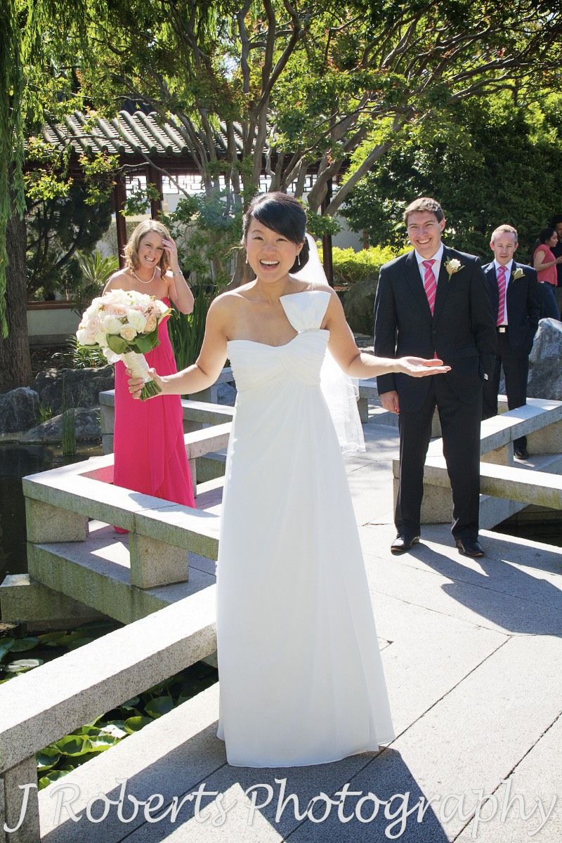 Bridal party laughing in chinese gardens sydney - wedding photography sydney
